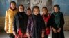 FILE - Afghan girls in Kabul, Afghanistan, Dec. 22, 2022. In addition to banning girls from attending middle and high school, the Taliban have indefinitely barred girls from taking private university entrance exams, tightening their ban on women’s education in the country.