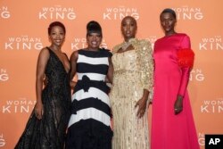 Thuso Mbedu, from left, Viola Davis, Lashana Lynch and Sheila Atim pose for photographers upon arrival for the UK Gala Screening of the film 'The Woman King' in London, Monday, Oct. 3, 2022. (Photo by Scott Garfitt/Invision/AP)