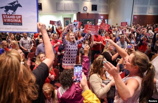 FILE - A Loudoun County School Board meeting was halted by the school board because the crowd refused to quiet down, in Ashburn, Virginia, U.S. June 22, 2021. (REUTERS/Evelyn Hockstein)