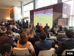 FILE - Diplomats at the United Nations watch the United States play Iran on Nov. 29, 2022, on a big screen set up by the Permanent Mission of Qatar to the United Nations.