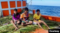 Three Rohingya boys, after they were rescued on Dec. 25, 2022, by a Thai fishing boat, with the cooperation of the Thai Maritime forces. (Photo via Thailand Maritime Enforcement Command Center/Facebook)