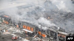 Russia firefighters battle a massive blaze the size of a football pitch which broke out overnight at the Mega Khimki shopping and entertainment center in Moscow&#39;s northern suburb of Khimki. Russian media later reported that one person had been killed in the fire.&nbsp;