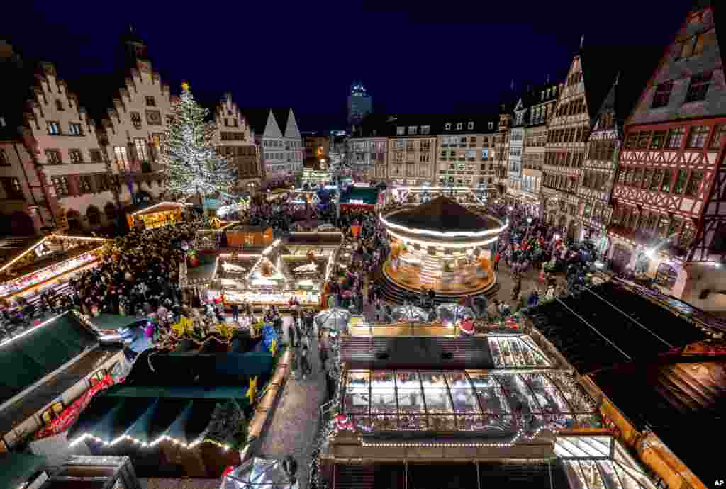 Lights illuminate the traditional Christmas Market that was opened in Frankfurt, Germany.