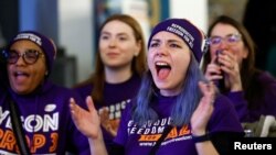 FILE: Women cheer during a Reproductive Freedom For All watch party on election night in Detroit, Michigan, November 8, 2022. 