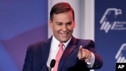 FILE - Rep.-elect George Santos speaks at an annual leadership meeting of the Republican Jewish Coalition, Nov. 19, 2022, in Las Vegas. Afterward, the group said Santos was no longer welcome.