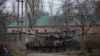 Ukrainian servicemen ride a tank in Bakhmut, Ukraine, Dec. 18, 2022. 