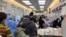Patients lie on beds at the emergency department of Zhongshan Hospital, amid the COVID-19 outbreak in Shanghai, China, Jan. 3, 2023. 