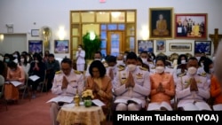 Officials pay their respects in front of a picture of Thailand’s Princess Bajrakitiyabha as she has been hospitalized due to a heart problem during the merit-making ceremony at Wat Thai Washington, DC, Silver Spring, MD. Dec 19, 2022.