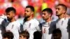 Iran’s Soccer Team Halfheartedly Sings National Anthem at World Cup