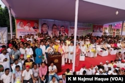 Opposition BNP leaders address a public rally in Faridpur, Bangladesh, Nov. 13, 2022, demanding the removal of Prime Minister Sheikh Hasina's government.