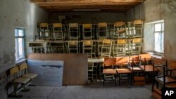 FILE - A classroom that previously was used for girls sits empty in Kabul, Afghanistan, Dec. 22, 2022.