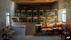 FILE - A classroom that previously was used for girls sits empty in Kabul, Afghanistan, Dec. 22, 2022.