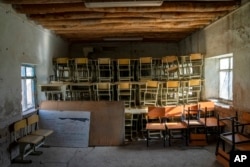 FILE - A classroom that previously was used for girls sits empty in Kabul, Afghanistan, Dec. 22, 2022.