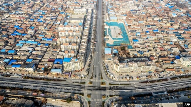 FILE - This aerial photo taken on Jan. 13, 2022 shows the city of Anyang in China's central Henan province.