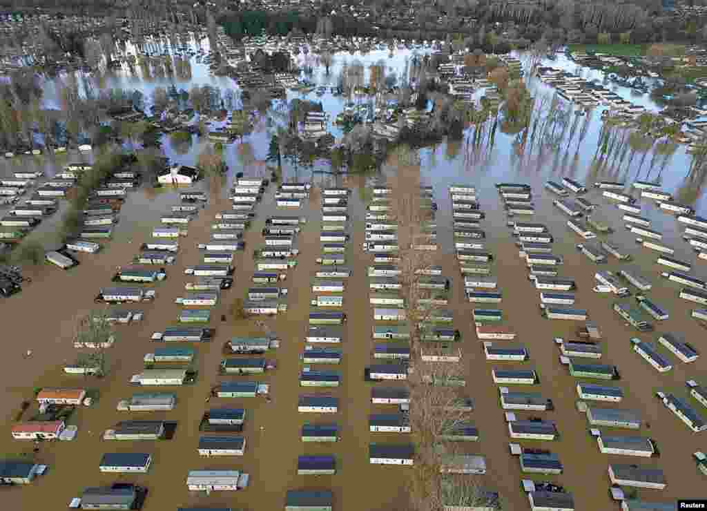 A drone view shows static caravans surrounded by floodwater after the River Nene burst its banks at Billing Aquadrome near Northampton, Britain.