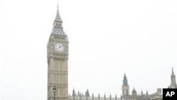 Back-dropped by Big Ben, demonstrators against the coalition government's spending cuts march in London, March 26, 2011