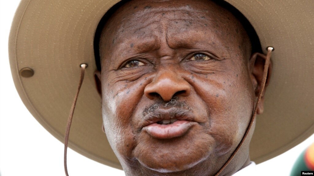 FILE - Uganda's President Yoweri Museveni talks to reporters in Rushere, Kiruhura district, west of Kampala, Feb. 18, 2011. 