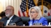 FILE - Vice Chair Liz Cheney, gives her opening remarks as Committee Chairman Rep. Bennie Thompson, left, looks on, as the House select committee investigating the Jan. 6, 2021, attack on the U.S. Capitol holds one of its public hearing.