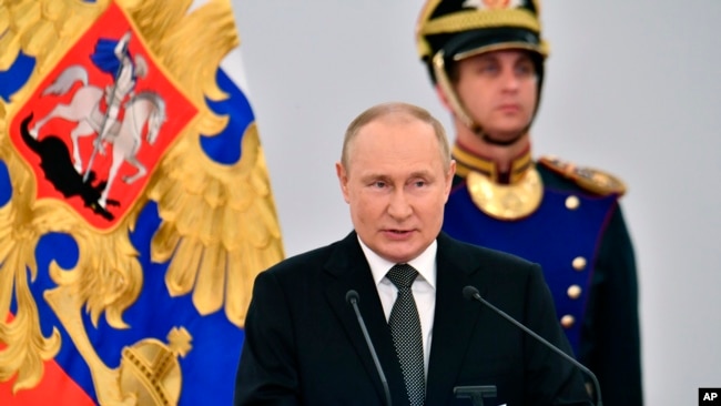 FILE - Russian President Vladimir Putin speaks during the State Prize awards ceremony while marking Russia Day in Kremlin in Moscow, Russia, June 12, 2022.