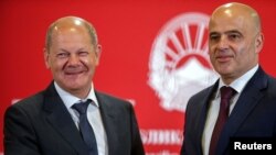 German Chancellor Olaf Scholz and North Macedonian Prime Minister Dimitar Kovacevski attend a news conference in Skopje, North Macedonia June 11, 2022.