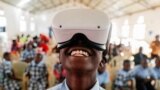 Francis Mwangi, 13, uses an Oculus virtual reality (VR) headset, to virtually visit Buckingham Palace during the celebration of Britain's Queen Elizabeth's Platinum Jubilee, in Nyeri, Kenya, June 2, 2022.