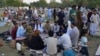 Afghan refugees seeking asylum abroad gather at an open field in protest to demand help from the U.N. High Commissioner for Refugees in Islamabad on May 7, 2022. 