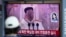 A woman watches a TV screen showing a news program reporting about North Korea's missile launch with a file footage of North Korean leader Kim Jong Un, at a train station in Seoul, South Korea, Sunday, June 5, 2022.