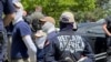 2022年6月11日，當局在愛達荷州“驕傲活動”現場附近逮捕白人至上主義組織“愛國者陣線”的成員。 （美聯社照片）