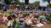 FILE PHOTO: Flowers, toys, and other objects to remember the victims of the deadliest U.S. school mass shooting in nearly a decade, resulting in the death of 19 children and two teachers, are pictured at the Robb Elementary School in Uvalde, Texas.