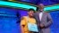 Actor LeVar Burton stands with Surya Kapu, 13, from South Jordan, Utah, during the Scripps National Spelling Bee, June 2, 2022, in Oxon Hill, Md.