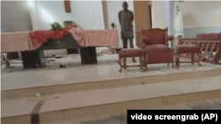 The altar of St. Francis Catholic Church in Ondo state, northwestern Nigeria, after gunmen opened fire on worshippers and detonated explosives, June 5, 2022.