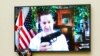 Rep. Greg Steube, R-Fla., holds up his own handgun as he speaks via videoconference as the House Judiciary Committee meets to advance a series of Democratic gun control measures, called the Protecting Our Kids Act, June 2, 2022.