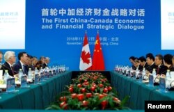 Chinese and Canadian officials attend the first China-Canada economic and financial strategy dialogue in Beijing, China, Nov. 12, 2018.