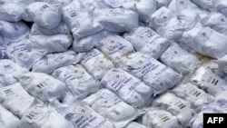 FILE - This picture shows a consignment of humanitarian aid supplied by India to Sri Lanka over the country's crippling economic crisis, in Colombo, May 22, 2022. The U.N. children’s fund is seeking $25 million for aid for 1.7 million children in Sri Lanka.