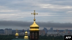 This photograph taken on June 5, 2022 shows smoke after several explosions hit the Ukrainian capital Kyiv early morning. 