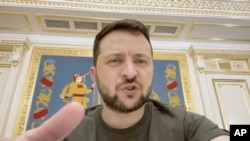 In this image from video provided by the Ukrainian Presidential Press Office, Ukrainian President Volodymyr Zelenskyy speaks from Kyiv, Ukraine, June 2, 2022. The address came on the 99th day of the Russian invasion and war in Ukraine.