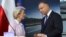 Polish President Andrzej Duda (right) and European Commission President Ursula von der Leyen speak after at a joint news conference with Poland's Prime Minister Mateusz Morawiecki at the headquarters of Poland's Power Grid in Konstancin-Jeziorna, Poland, 