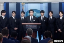 FILE - Members of the K-Pop band BTS make statements against anti-Asian hate crimes and for inclusion and representation during the daily briefing at the White House in Washington, U.S., May 31, 2022. (REUTERS/Leah Millis)