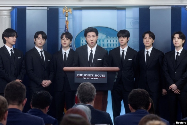 FILE - Members of the K-Pop band BTS make statements against anti-Asian hate crimes and for inclusion and representation during the daily briefing at the White House in Washington, U.S., May 31, 2022. (REUTERS/Leah Millis)