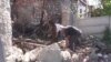 Kharkiv Residents Clear Damage After Shelling