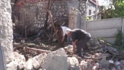 Kharkiv Residents Clear Damage After Shelling