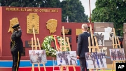 King Philippe of Belgium lays a wreath during a ceremony at the Veterans Memorial in Kinshasa, Democratic Republic of the Congo, June 8, 2022. King Philippe was on the second day of a six-day visit.