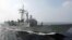 FILE - A Perry-class frigate from the Taiwanese navy runs through exercises off Kaohsiung, Taiwan.
