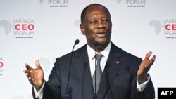 Le président ivoirien Alassane Ouattara s'exprime lors de la cérémonie d'ouverture de l'Africa CEO Forum à Abidjan le 13 juin 2022.