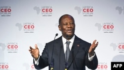 Le président ivoirien Alassane Ouattara s'exprime lors de la cérémonie d'ouverture de l'Africa CEO Forum à Abidjan le 13 juin 2022.