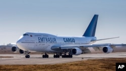 A Venezuelan-owned Boeing 747 taxis on the runway after landing in the Ambrosio Taravella airport in Cordoba, Argentina, June 6, 2022. 