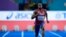 FILE - Christian Coleman of the United States competes in a men's 60 meters heat at the World Athletics Indoor Championships in Belgrade, Serbia, March 19, 2022. Coleman won the men's 100 meters in 9.92 seconds at the NYC Grand Prix on June 12, 2022.