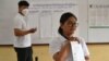 Cambodian election officials count ballots at a polling station during local commune elections in Phnom Penh, June 5, 2022. 