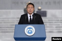 South Korean President Yoon Suk-yeol speaks during a ceremony marking Korean Memorial Day at the Seoul National cemetery on June 06, 2022 in Seoul, South Korea.