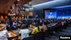 A general view of the room during the speech of Director-General of the World Trade Organization (WTO) Ngozi Okonjo-Iweala at the opening of the 12th Ministerial Conference, at WTO headquarters in Geneva, Switzerland, June 12, 2022.
